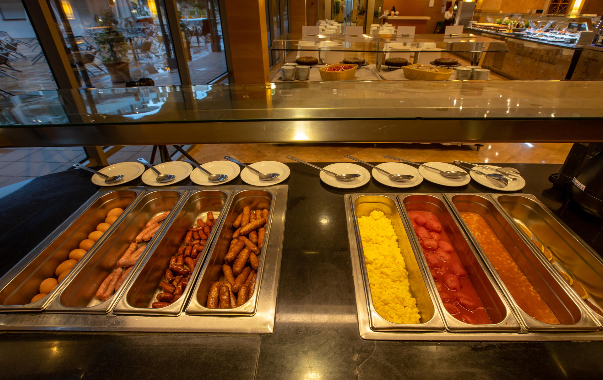 Boiled eggs, sausages, sausages, sausages, scrambled eggs, beans and pancakes.